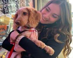 Her love for animals could be estimated with the fact that how she picks them and cuddles them. She has also adopted two dogs in her home.